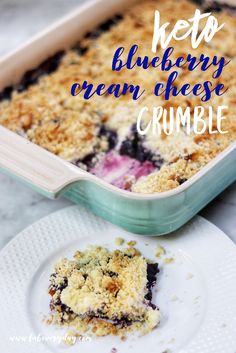 a blueberry cream cheese crumble is on a plate next to a casserole dish