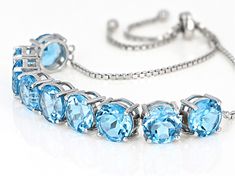 16.92ctw 8mm Round Swiss Blue Topaz, Rhodium Over Sterling Silver Bolo Bracelet. Adjusts Approximately 6"-9"L And Measures Approximately .32"W. Sliding adjustable closure. Formal Blue Topaz Bracelet, Fine Jewelry Blue Topaz Round Bracelets, Silver Blue Topaz Bracelets As Gift, Elegant Sterling Silver Bracelet With Blue Topaz, Adjustable Blue Topaz Bracelet Jewelry, Elegant Sterling Silver Blue Topaz Bracelet Gift, Luxury Silver Bracelet With Blue Topaz, Broken Chain, Pearl Strands