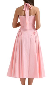 Fall for the retro-inspired silhouette of this halter dress designed with a pleated corseted bodice and a flared skirt. Exclusive retailer Halter neck Lined 65% cotton, 32% nylon, 3% elastane Dry clean Imported