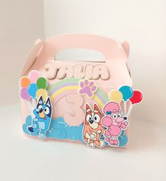 a pink box with cartoon characters on it