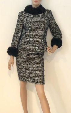 "Simply gorgeous vintage 1980s Devon Hall two piece suit, featuring a double breasted jacket with statement buttons closure, and a full, all around fur collar and cuffs; and a just above the knee length pencil skirt. Fabulous silhouette and drape. Unlined. Skirt has zipper and button closure. Round front buttons measure nearly 1 1/2\" in diameter. Approximate Measurements: Jacket: Chest: 38\"; Shoulder: 16.5\"; Length: 24\" Skirt: Waist: 28\"; Hips: 36\"; Length: 24\" No size label - likely a si Winter Workwear Sets With Buttons, Classic Winter Skirt Suit With Button Closure, Winter Classic Skirt Suit With Button Closure, Classic Winter Skirt Suit With Buttons, Classic Office Sets For Winter, Vintage Winter Skirt Suit For Work, Vintage Single-breasted Long Sleeve Skirt Suit, Vintage Long Sleeve Single Breasted Skirt Suit, Vintage Single-breasted Long-sleeve Skirt Suit