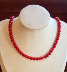 Red coral beaded necklace. This beautiful piece is very dynamic and simple can be worn on any occasion. Beads are 7mm Healing with Coral ♥ Absorbs negative energy ♥ Platonic love ♥ Friendship ♥ Community ♥ Creativity ♥ Passion ♥ Romantic love ♥ Wisdom ♥ Optimism ♥ Enthusiasm ♥ Balance ♥ Relaxation ♥ Protection ♥ Safe travel on water Coral represents diplomacy and concurrence. It quiets the emotions and brings peace to within the self. Facilitates intuition, imagination and visualisation. Coral e Red 8mm Bead Necklace, Elegant Red Coral Round Bead Necklaces, Elegant Red Coral Round Bead Necklace, Red Necklaces With 8mm Beads For Jewelry Making, Red Coral Jewelry With 8mm Beads, Elegant Adjustable Red Coral Necklace, Elegant Red Coral Jewelry With 8mm Beads, Elegant Red Coral Gemstone Beads, Red Coral Gemstone Beads Necklace