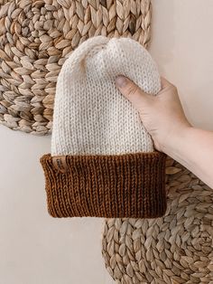 "The Two-Tone Black Locust Beanie is a stretchy, versatile hat with a double-thick weight and contrasting color brim. Thicker than our Linden Beanie, the brim can be folded up, or worn down for some extra slouch. If hat is flipped inside out, it's reversible for a solid color look (without pom)! Just three size options make for a long-lasting fit. For in-between ages, size up! small: 0-6 months medium: 6-36 months large: 3 years - adult HOW TO ORDER: See last photo slides for color options for y Two Tone Beanie, Photo Slides, Knitting Machine, Brim Hat, Knit Hat, Knitting Inspiration, Machine Knitting, Folded Up, Knit Beanie