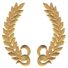 an image of a gold laurel with two snakes on it's sides and one snake in the middle