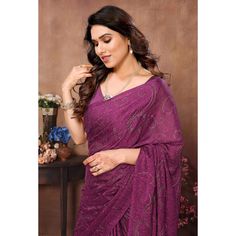 Purple colored saree is made from georgette rangoli silk (Poly Silk) fabric which is highlighted with beautiful mukaish & foil printed work with tassels border as shown. comes along unstitched banglori silk blouse piece which you can customise as per your design/style. Occasion - You can buy this saree for party and functions. Note:- The actual product may differ slightly in color and design from the one illustrated in the images when compared with computer or mobile screen. Measurements: Saree Celebration Purple Georgette Pre-draped Saree, Purple Georgette Embroidered Fabric For Festivals, Purple Embroidered Georgette Fabric Saree, Purple Embroidered Georgette Fabric For Festivals, Purple Bollywood Style Embroidered Georgette Fabric, Bollywood Style Purple Embroidered Georgette Fabric, Festive Purple Embroidered Georgette Fabric, Purple Self Design Georgette Saree, Purple Georgette Saree With Self Design