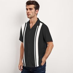 • 60s Shirt Style Men: Embrace the iconic 60s fashion with this stylish shirt, perfect for adding a retro touch to your wardrobe.• Black Retro Shirt Men: This shirt features a classic design with white stripes, capturing the essence of vintage retro style.• Black Vintage Bowling Shirt: With a nostalgic bowling shirt cut, this top combines comfort and style for a fun, casual look.• Black and White Color Block Shirt Men: The bold color block pattern adds a modern twist to the vintage style, making Modern Black Summer Shirt, Retro Black Collared Shirt, Black Johnny Collar Short Sleeve Shirt, Retro Black Shirt For Summer, Retro Black Summer Shirt, Vintage Black Summer Shirt, Trendy Black Collared Shirt, Black Short Sleeve Retro Shirt, Black Camp Shirt With Johnny Collar