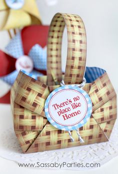 there's no place like home gift box with ribbon and tag on the top