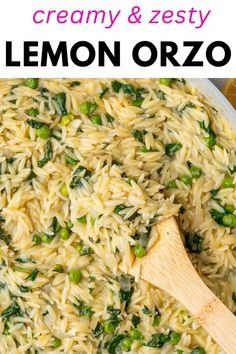 a pan filled with lemon orzo next to a wooden spoon on top of it