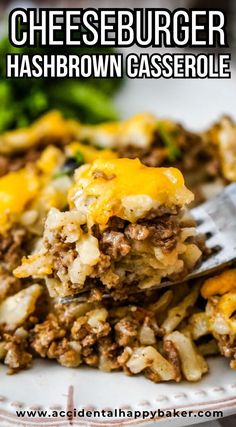 cheeseburger hashbrown casserole on a white plate with a fork