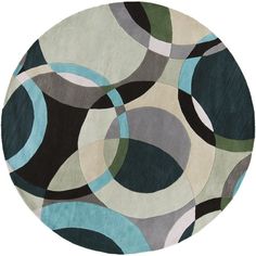 a round rug with circles on it in blue, green and grey colors is shown