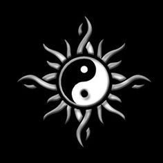 the sun and yin symbol on a black background