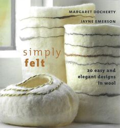 the cover of simply felt by margartt docherty, featuring slippers and pillows