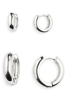 This set of polished huggie hoops delivers dainty or bold shine, depending on the size you choose for the day. Set includes two pairs of earrings 1/2" hoop diameter; 7/8" hoop diameter Post back 14k-gold plate or sterling silver plate Imported Stackable Sterling Silver Huggie Earrings, Sterling Silver Stackable Huggie Earrings, Sterling Silver Hoop Huggie Earrings Stackable, Elegant Silver Stackable Hoop Earrings, Silver Stackable Hoop Earrings For Everyday, Modern Stackable Round Hoop Earrings, Silver Stackable Huggie Earrings, Silver Huggie Hoop Earrings Stackable, Silver Hoops Earrings