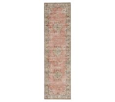 an orange and beige runner rug on a white background with a floral design in the middle