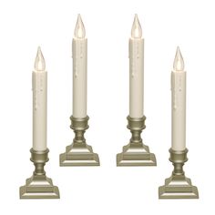 three white candles sitting next to each other