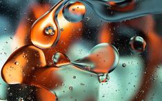 water drops on the glass with orange and blue colors