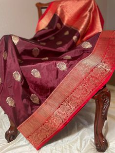 A beautiful dark brown and red border banarasi pure katan silk saree.With zari motif all over the body and floral zari border. Completed with a rich pallu and plain red running blouse piece with zari border on one side. Blouse cloth size: 1.10 m by 0.87 m No falls, pico or tassels done Maintenance: Dry wash advisable Returns and refund only accepted on defective products. Product should be shipped back in 3 days after delivery . Please go through our return policies below. Our Policy on Returns, Burgundy Traditional Wear With Dupatta For Festivals, Traditional Burgundy Wear For Festive Occasions, Traditional Burgundy Saree For Festive Occasions, Burgundy Traditional Wear For Diwali, Burgundy Traditional Wear For Festivals, Traditional Burgundy Wear For Festivals, Brown Dupatta For Puja And Festivals, Burgundy Traditional Wear With Zari Work For Festivals, Brown Tussar Silk Dupatta With Pallu