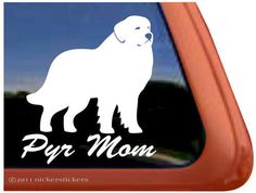 a dog sticker on the side of a car