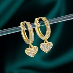 Dangle Heart Hoop Earring For Women in 10K, 14K and 18K Solid Gold, Minimalist Huggie Earring For Wife, Elegant Bride Earrings For Wedding, Gift Mom, Best Friend Gift. This dainty and unique looking earring is a perfect gift for your mom, best friend or wife and they will surely love it. A touch of elegance with a hint of daintiness makes this piece a favorite. Details of the product Material: Silver and 10K, 14K, 18K Solid Gold Gemstone: Cubic Zirconia Dainty Gift Idea; Valentine's Day Gift, Birthday Gift, Anniversary Gift, Gift For Engagement or Wedding, Promise Gift, Christmas Gift, Black Friday Gift, Mother's Day Gift, International Women's Day Gift, Memorial Day Gift; Unique Gift For People You Love; Mom, Girlfriend, Wife, Fiance, Best Friend. You can make the most important person in Anniversary Heart Charm Dangle Hoop Earrings, Anniversary Dangle Hoop Earrings With Heart Charm, Minimalist Dangle Hoop Earrings For Valentine's Day, Elegant Hoop Earrings With Heart Charm For Weddings, Elegant Wedding Hoop Earrings With Heart Charm, Heart-shaped Hoop Earrings For Valentine's Wedding, Heart-shaped Hoop Earrings For Wedding On Valentine's Day, Drop Hoop Earrings For Wedding On Valentine's Day, Wedding Huggie Earrings With Heart Charm