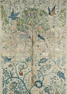 an embroidered wall hanging with birds and flowers on the outside, in front of a white background