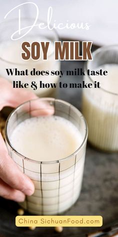 someone is holding a glass with milk in it on a tray and the words delicious soy milk