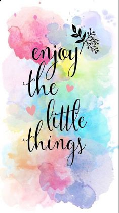 the words enjoy the little things on a watercolor background