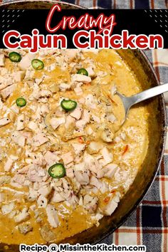 a skillet filled with chicken and vegetables on top of a checkered table cloth