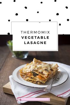 thermomix vegetable lasagne on a plate with a fork and napkin