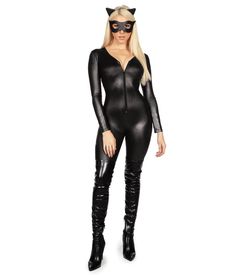 a woman in black catsuits and cat ears is posing with her hands on her hips