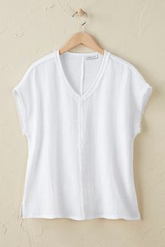 Our light-as-air gauze, now in a fresh, boxy style with raw edges for a twist of texture. Breathable and lightly textured, in a simple slipover design with dolman cap sleeves. Imported. Cute White Tops Blouses, Woven Top Pattern, Cotton Gauze Top, Cute White Tops, Gauze Top, Double Gauze, Woven Top, Petite Size, Top Pattern