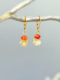 Colorful dangly drop orange Oregon sunstone and yellow citrine dangle earrings in your choice of gold fill, rose gold fill, or sterling silver.  A lovely gift for a mom, wife, or girlfriend. Handmade November birthstone gemstone jewelry for women. Handmade Jewelry crafted with love one at a time in my northern Michigan studio. Gemstones are nature's creations and may vary slightly in color and inclusions, but all are lovely and hand selected to match. These earrings are Dainty approx 1 1/4"  lon Orange Citrine Gemstone Earrings, Orange Teardrop Citrine Jewelry, Gold Earrings With Citrine Birthstone, Gold Citrine Earrings With Birthstone, 14k Gold Filled Faceted Earrings For Gift, Elegant Everyday Orange Jewelry, Orange Gemstone Dangle Earrings, Orange Gemstone Dangle Jewelry, Citrine Dangle Earrings As A Gift