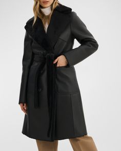 LaMarque "Abigail" peacoat featured in fully reversible faux shearling (polyester/polyurethane/polyester)    Approx. 40.5”L from shoulder to hem    Notched lapels; doublebreasted front    Long sleeves    Front patch pockets    Removable tie belt    Midlength    Dry clean    Imported Leather Industry, Reversible Coat, Leather Pieces, Puffer Coat, Tie Belt, Black Coat, Wool Coat, Silk Blouse, Neiman Marcus