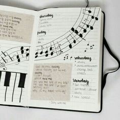 an open notebook with music notes and piano keys