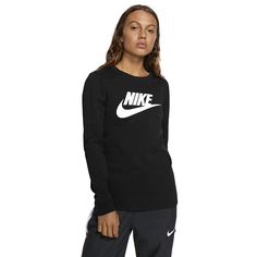 Perfect as a base layer or worn on its own, this Nike women's tee sets you up for all-day comfort. Perfect as a base layer or worn on its own, this Nike women's tee sets you up for all-day comfort. Soft jersey construction Crewneck Long sleevesFABRIC & CARE Cotton Machine wash Imported Size: Small. Color: Charcoal. Gender: female. Age Group: adult. Nike Products, Nike Sportswear Women, Nike Tee, Womens Nike, Black Nike, Cotton Logo, Sportswear Women, Base Layer, Shirt Women