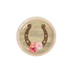 a paper plate with a horseshoe and flowers on it