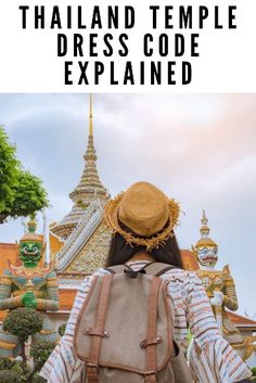 a person with a backpack and hat standing in front of a building that says thailand temple dress code expired