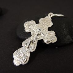 Beautiful sterling silver Orthodox cross, Jesus Christ Crucifix. Made from 925 sterling silver, two hallmarks. Size (without ear) - 48x29 mm. Weight - 4.6 gr. Please visit my over stores on Etsy: https://www.etsy.com/shop/G7Elephants https://www.etsy.com/shop/VintageUSSR Sterling Silver Cross Charms For Anniversary, Sterling Silver Cross For Anniversary, Sterling Silver Cross Jewelry For Anniversary, Silver Crucifix Cross Necklace For Anniversary, Hallmarked Silver Cross Necklace, Silver Hallmarked Cross Necklace, Nickel-free Sterling Silver Cross Charm, Sterling Silver Cross Charms With Polished Finish, Hallmarked Silver Cross Pendant