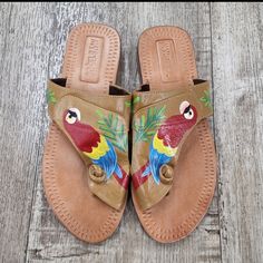 These Sandals Are Absolutely Stunning, Perfect For The Beach, Resort, Paradise Getaway. Get Ready To Make A Statement In These Unique Parrot Hand Crafted Leather Sandals. Leather Toe Post Flip Flops For Vacation, Adjustable Toe Ring Slip-on Sandals For Vacation, Adjustable Slip-on Toe Ring Sandals For Vacation, Summer Leather Toe Post Flip Flops, Leather Toe Post Summer Flip Flops, Leather Toe Loop Flip Flops For Summer, Leather Toe Post Flip Flops For Summer, Leather Toe Loop Flip Flops For Beach, Tropical Open Toe Sandals For Vacation