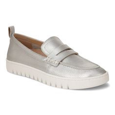 a women's silver loafer with white soles