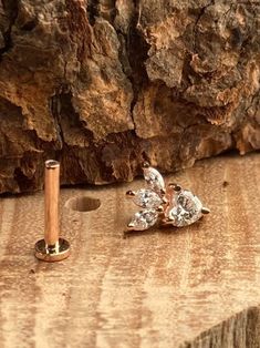 Material: 14 karat white gold, 14 karat yellow gold, 14 karat rose gold. Dimension 7.9 mm x 6.5 mm Primary stones heart 3.5 x 3.5mm Secondary Stones Marquise: 3.0 x 1.5 mm Diamond quality:SI Diamond color: G-H This listing is purchased as a set with the decorative gold end and the labret flat back post. This item is sold with one decorative and and one post if you would like a set of earrings he will need to do quantity 2 These diamonds are hand selected gorgeous quality matched for brilliance a Dermal Implants, Nose Rings, Nose Ring Stud, Stone Heart, Diamond Color, Diamond Heart, Colored Diamonds, Natural Diamonds, Etsy Earrings