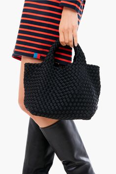 Naghedi handbags are the result of founder, Sara Naghediâs, decade-plus career in fashion design. Crafted from durable neoprene, each bag is multifunctional and just right for adventuring by land, sand, or sea. Large enough for your essentials with a convenient shoulder strap, this tote is a must-have! Open top Unlined Interior zippered pouch (included) Shoulder strap (included) Woven neoprene Material: 100% Terylene Care: Spot clean with mild soap Black Satchel With Braided Handles For Travel, Versatile Black Bucket Bag With Braided Handles, Modern Black Bags With Braided Handles, Functional Black Shoulder Bag With Handles, Saint Barts, Career In Fashion, Career In Fashion Designing, St Barths, St Barts