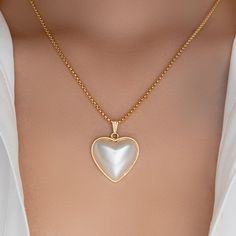 420295279300110944102400631417 Material: gold plated brass Length: 18" + 2" extension Pendant size: 1" x 1" IMPORTED Gold-tone Heart Pendant Necklace, Gold-tone Gold Plated Heart Necklace, Gold-tone Gold-plated Heart Necklace, Gold-tone Heart Pendant Necklaces, Gold Heart-shaped Pearl Pendant Jewelry, Plated Heart Pendant Necklaces, Heart-shaped Gold Plated Pearl Pendant Jewelry, Gold-tone Tarnish Resistant Necklace For Valentine's Day, Valentine's Day Gold-tone Tarnish Resistant Necklace