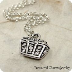 This Treasure Chest Charm necklace comes on a silver-plated chain that is available in different lengths. Please choose your desired length from the drop-down menu when placing the item in your shopping cart. { CHARM DETAILS }★ Material: Pewter ★ Finish Color: Silver★ Measurements: 1/2" x 1/2"★ Dimensions: Two-sided{ SIMILAR ITEMS } More pirate themed items available from my shop: https://www.etsy.com/shop/treasuredcharms/search?search_query=pirate{ GIFT OPTIONS}Gift boxes are available at no ad Nickel Free Silver Charm Necklaces As Gift, Silver Chain Metal Charm Necklace As Gift, Silver Charm Necklace With Box Chain As A Gift, Silver Charm Necklaces With Box Chain As A Gift, Nickel-free Silver Charm Necklaces As Gift, Silver Charm Necklace With Box Chain For Gift, Nickel-free Metal Charm Necklaces As Gift, Sterling Silver Box Chain Charm Necklaces, Nickel-free Silver Charm Necklaces For Gifts