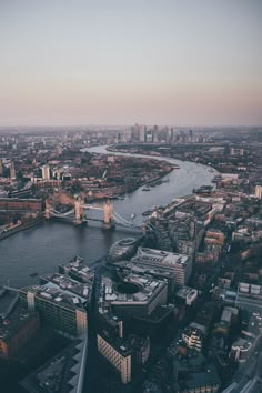 an aerial view of the river thames in london, england taken from the top of the shardle