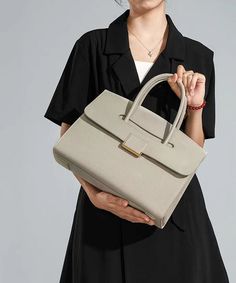 Boutique Beige Solid Durable Calf Leather Tote HandbagThis bag is made of fine Calf Leather fabric.Measurement: 25cm/9.75" * 34cm/13.26" * 12cm/4.68"Inside pockets. Large Capacity Clutch For Office, Modern Satchel Clutch For Office, Modern Office Satchel Clutch, Chic Beige Laptop Bag, Beige Rectangular Office Bag, Formal Double Handle Baguette Bag With Large Capacity, Versatile Business Handheld Satchel, Versatile Handheld Business Satchel, Chic Beige Rectangular Laptop Bag