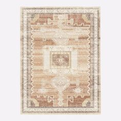 a beige and brown rug with an ornate design on the center, in front of a white background