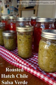 several jars filled with food sitting on top of a table