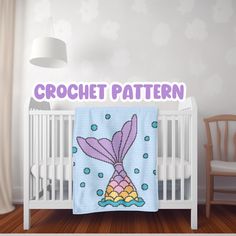 there is a crochet pattern on the baby's blanket in this room