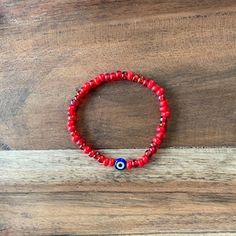 Beautiful red mix seed bead mix bracelet with evil eye. Stack with other bracelets of wear alone. This listing is for 1 single bracelet. Stacking Jewelry, Single Bracelet, Bracelet Stacking, Lucky Bracelet, Seed Bead Bracelet, Jewelry Minimalist, Stacked Jewelry, Seed Bead Bracelets, Bead Bracelet