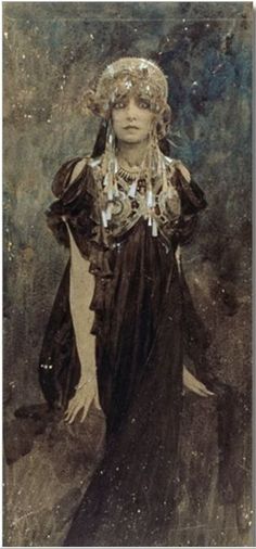 an old photo of a woman wearing a dress and headdress, standing in the grass